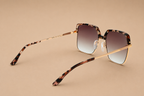 Bulget - Lunettes de Soleil Oversize Or Rose Havane (vue 4) — Bulget | View Optik